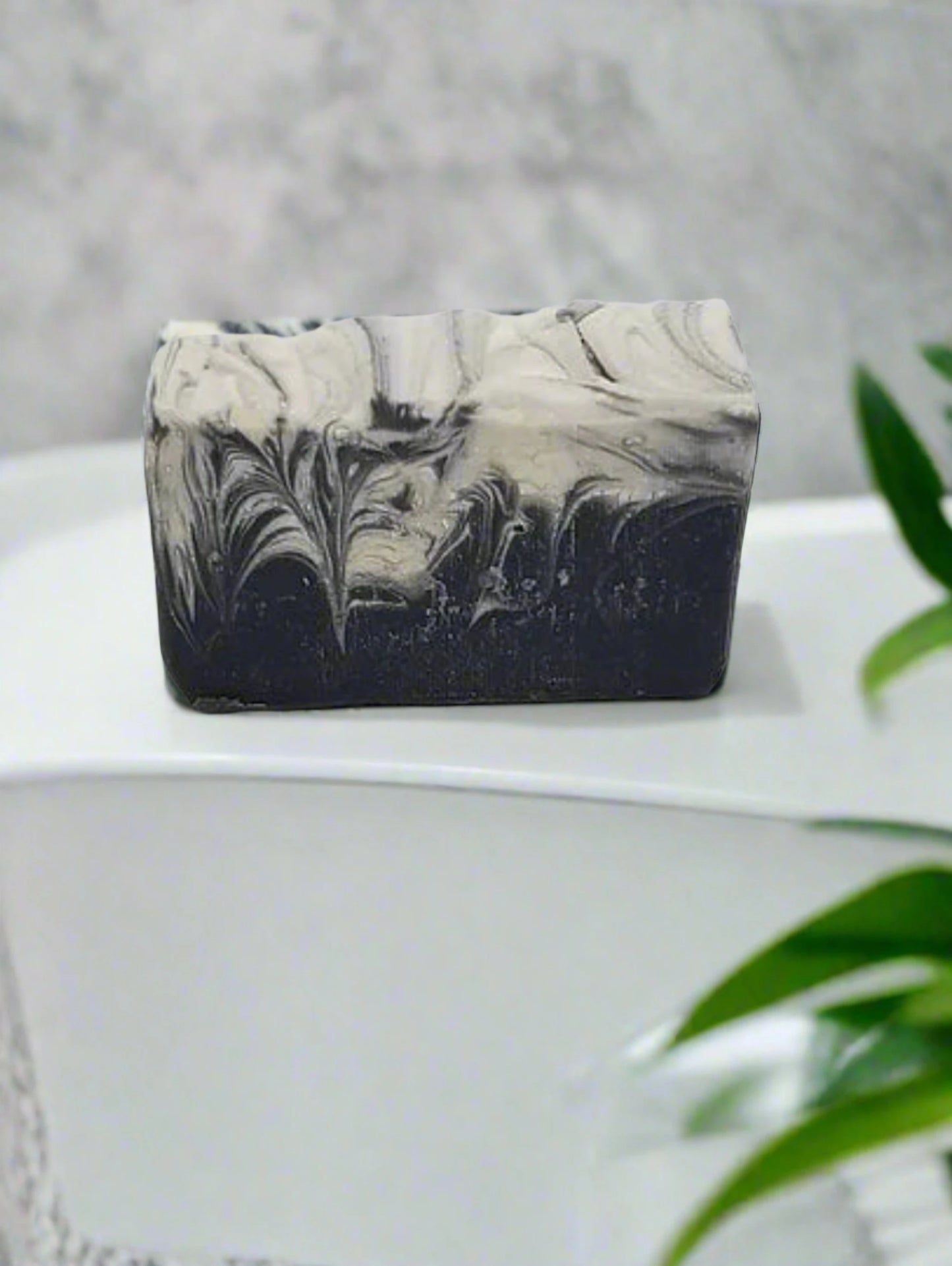 A captivating black and white blend of charcoal, cocoa butter and shea butter.